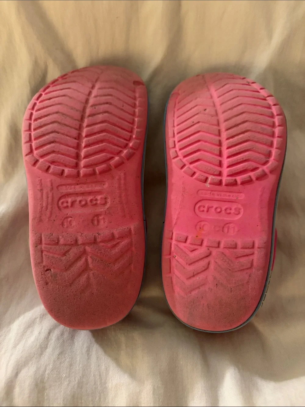 CROCS Kids Pink Clogs with Blue Soles